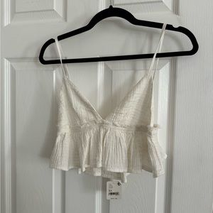 Never been worn really cute free people shirt